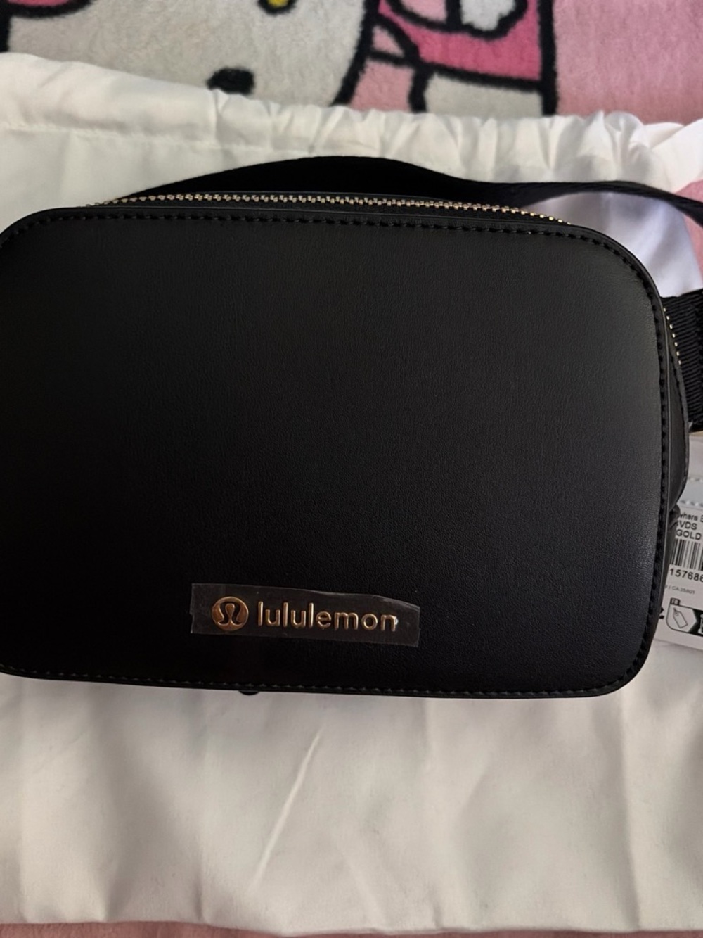 lululemon Black Leather Crossbody Bag with Gold Logo